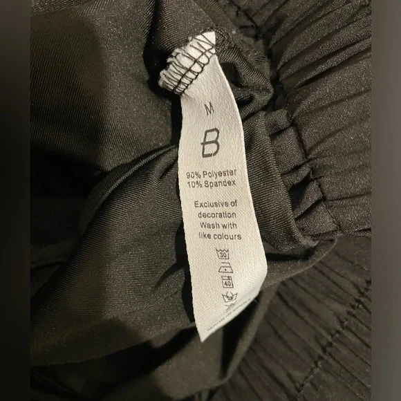 Black Trendy Athletic Dolphin Shorts - Picture 3 of 5